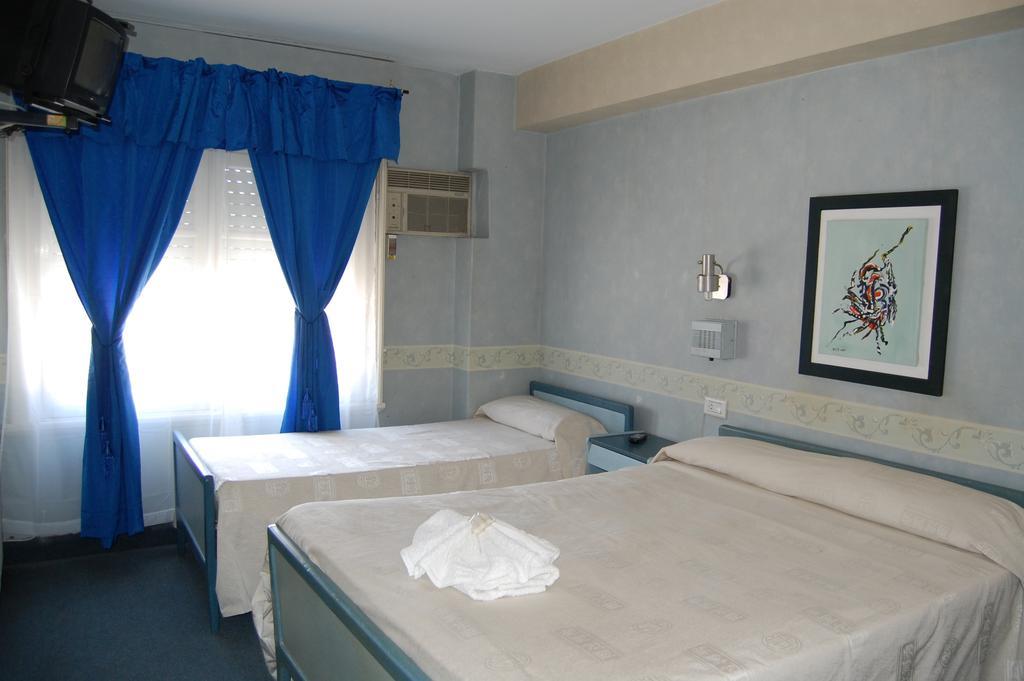 Monte Carlo Hotel Villa Carlos Paz Habitación foto
